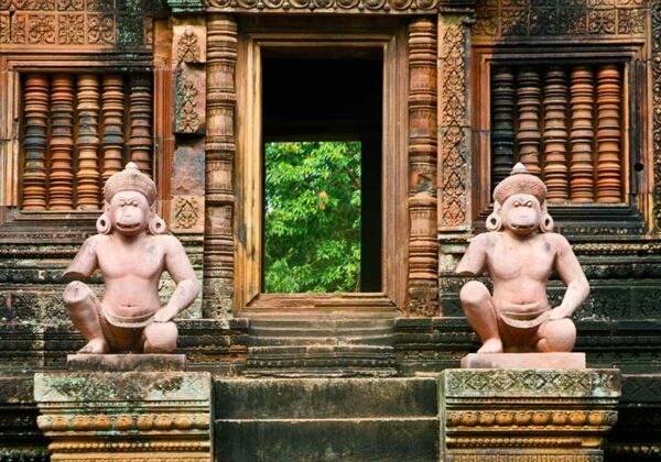 Ancient statues in Banteay Srei temple Siem Reap complex Cambodia