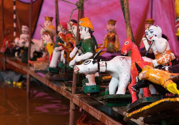 Common Vietnamese water puppets behind puppetry state